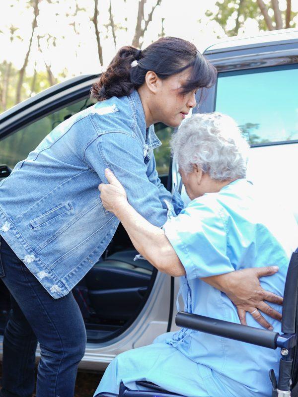 Help And Support Asian Senior Or Elderly Old Lady Woman Patient Sitting On Wheelchair Prepare Get To Her Car : Healthy Strong Medical Concept.